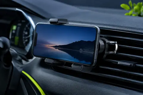 Support smartphone noir à crochet métallique réglable, fixé sur une grille d’aération de voiture